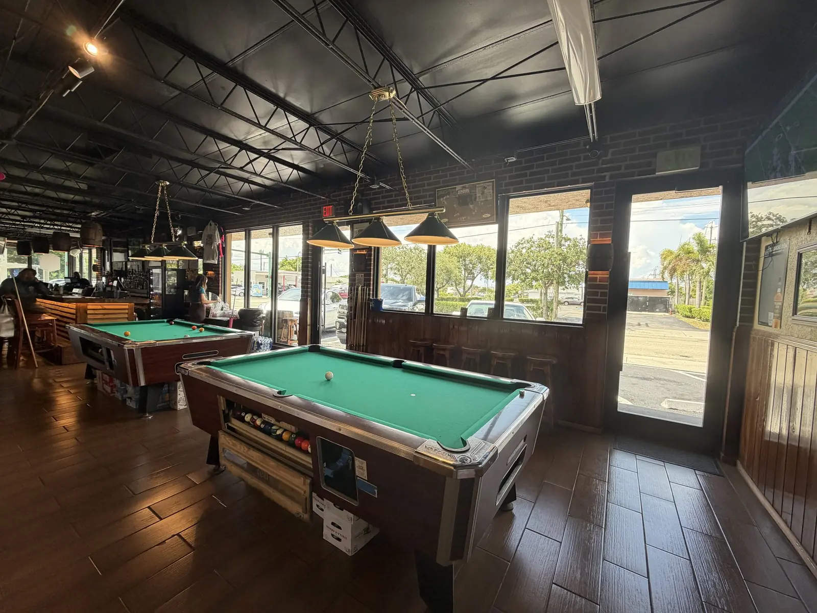 Two pool tables in the front room at Locals Only in Lake Worth Beach